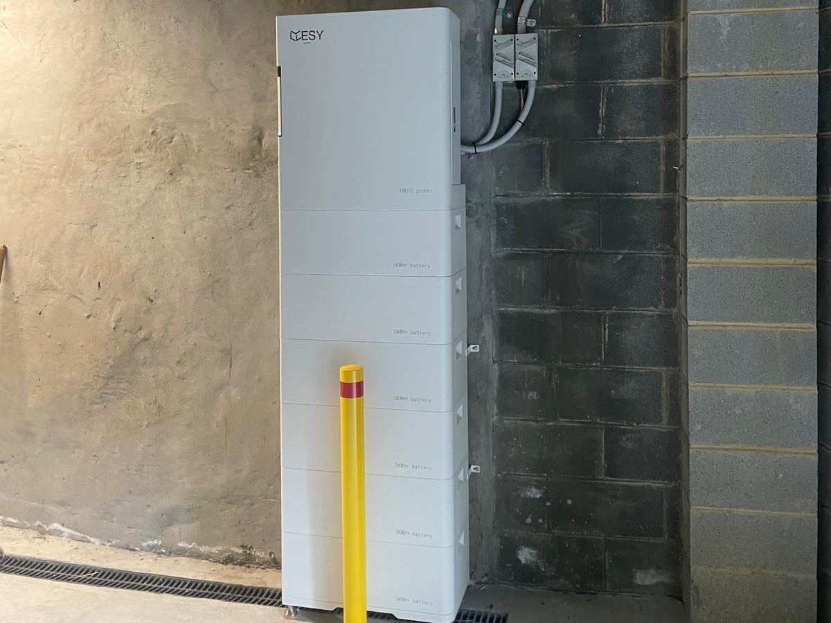 Esy Sunhome battery installed in a home garage