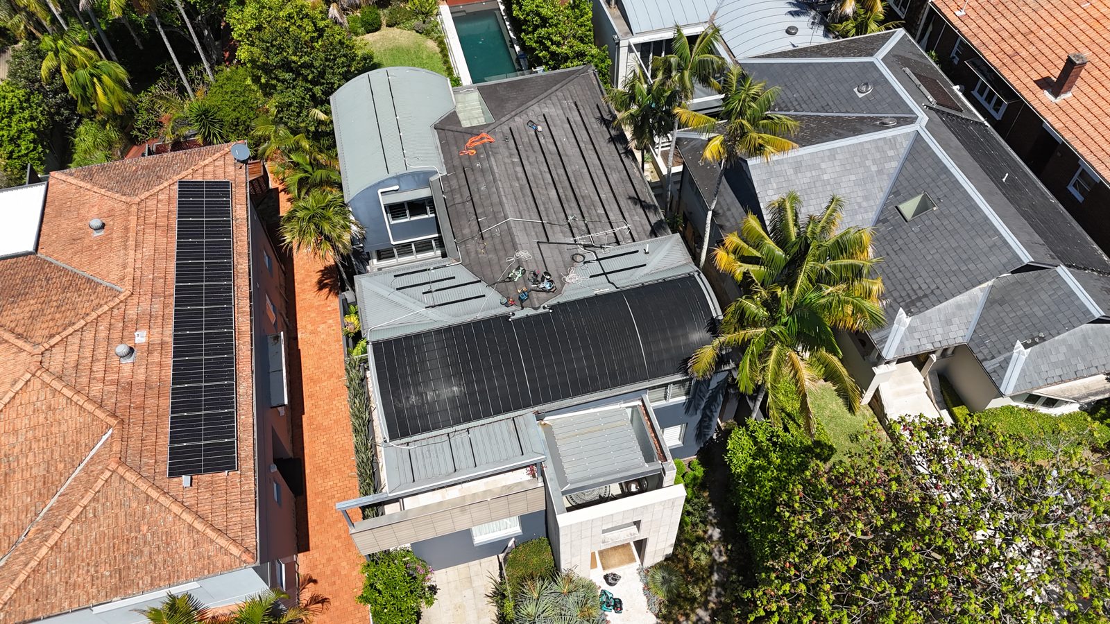 Aerial view of shared solar across a row of townhouses